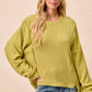 Cozy olive green BiBi Boucle rib knit sweater with boxy sleeves
