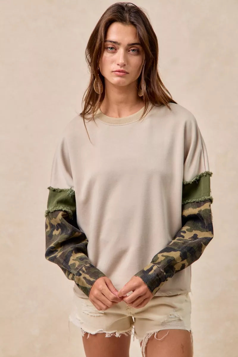 BiBi Camo Sleeve French Terry Top with Frayed Edge | Daverri Fashions