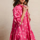 Vibrant pink BiBi ribbon pattern dress with scallop edges and ruffles