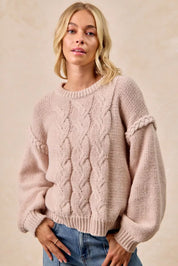 Pastel pink BiBi cable knit sweater with balloon sleeves and ribbed hem