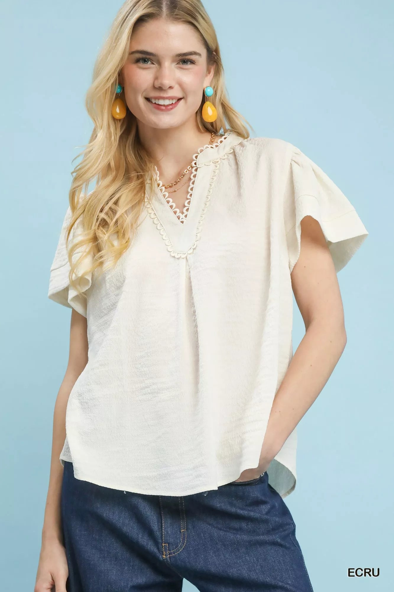 Umgee cream seersucker short sleeve top with ruffled sleeves and lace trim