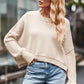 Beige oversized round neck drop shoulder knit sweater with ribbed cuffs
