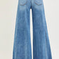Blue RISEN high-rise ankle wide jeans in denim with frayed hem