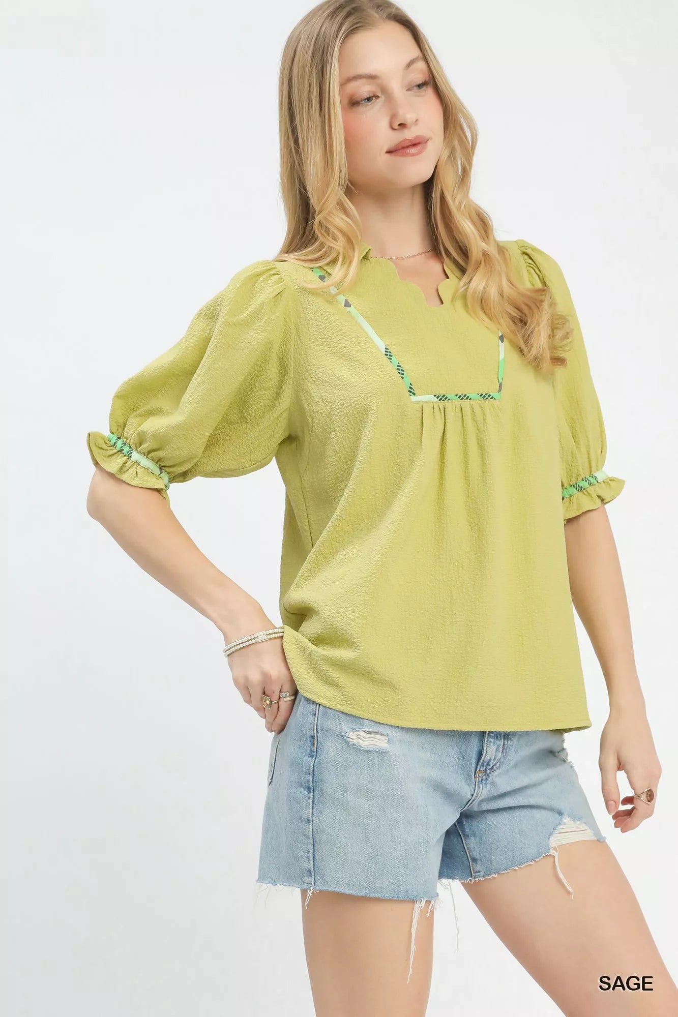 Sage-colored Umgee scalloped trim blouse with puff sleeves and embroidered neckline