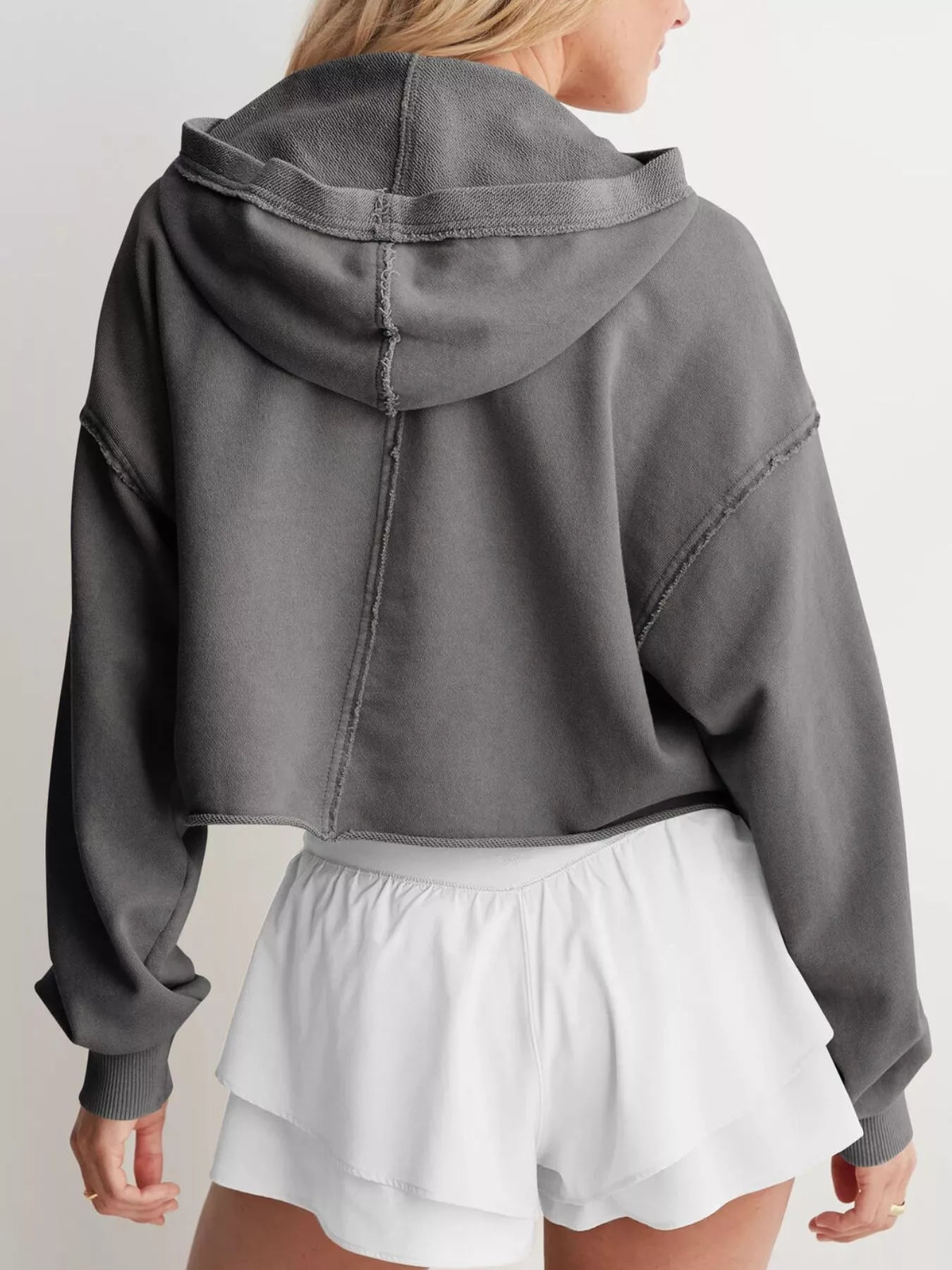 Exposed Seam Dropped Shoulder Hoodie in cropped dark gray with stitching