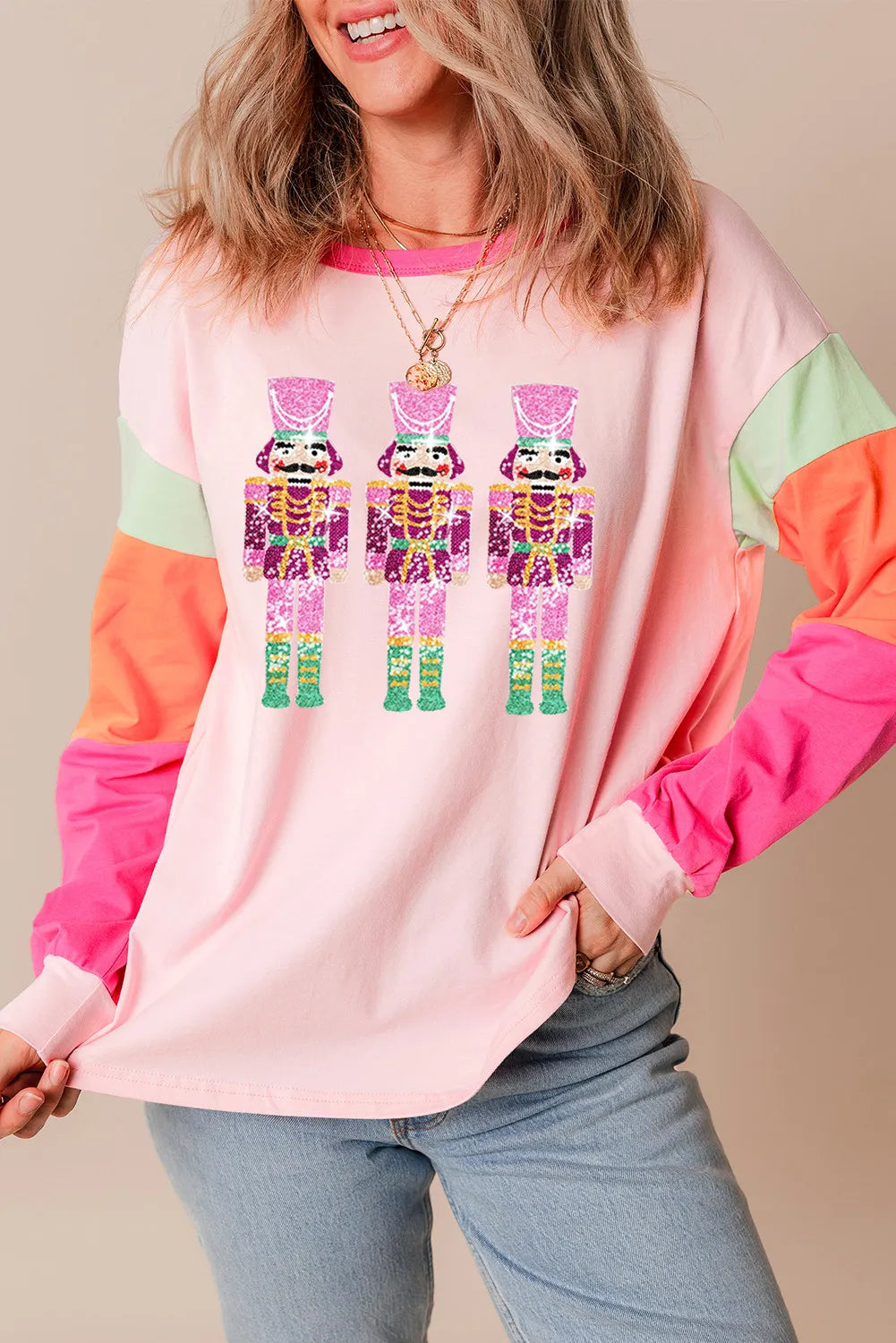 Blush Pink Sequin Nutcracker Round Neck Long Sleeve Top | Tops Daverri Fashions