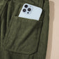 Olive green women’s high-waist corduroy pants with phone in pocket