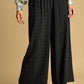 Umgee high-waisted embellished linen pants in black with metallic dots