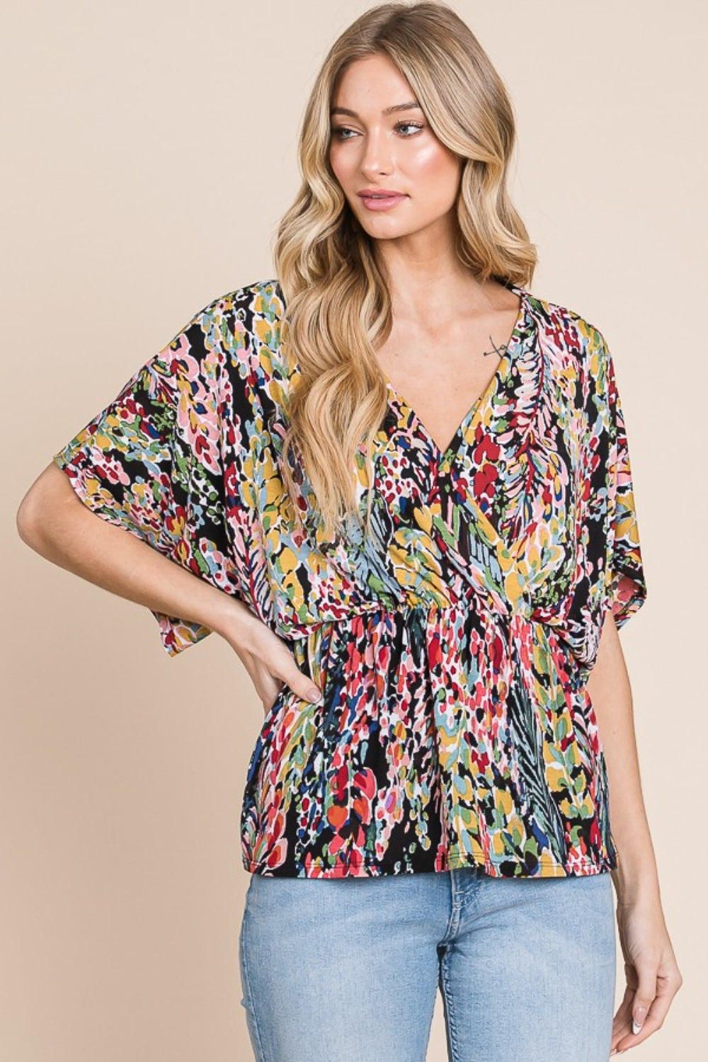 BOMBOM Printed Surplice Peplum Blouse | Daverri Fashions
