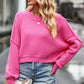 Vibrant pink round neck drop shoulder long sleeve cropped sweater