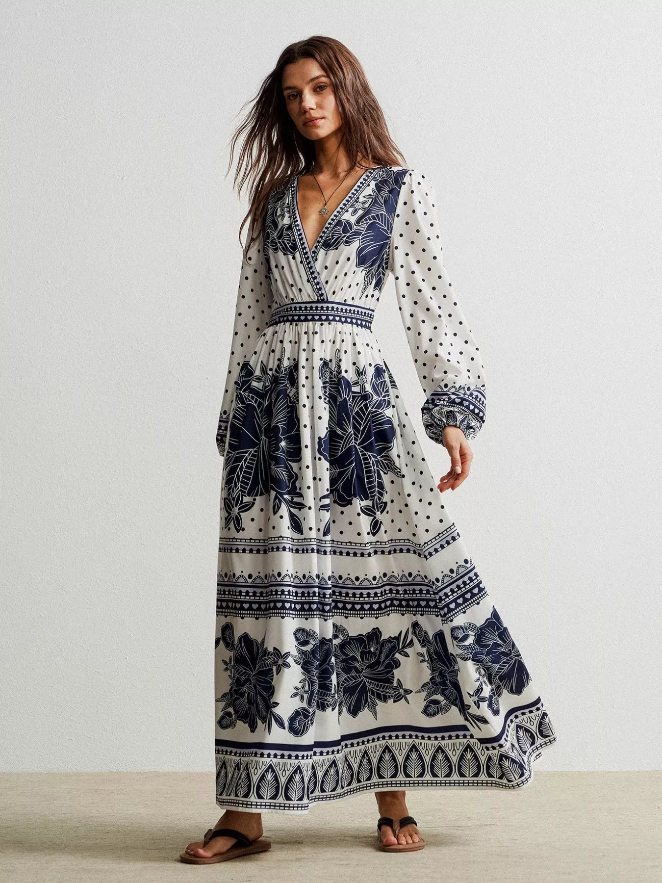 Floral print long sleeve maxi dress with navy blue patterns and v-neck