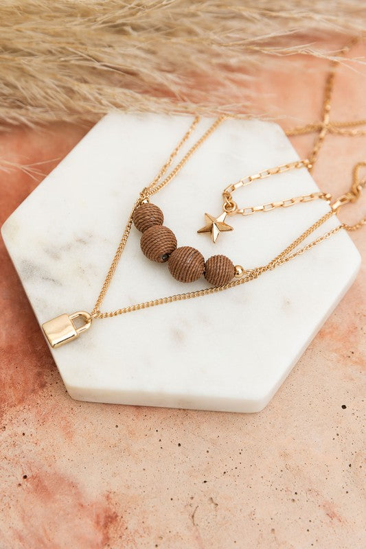 Three Layered Rustic Gold Charmed Necklace Necklaces