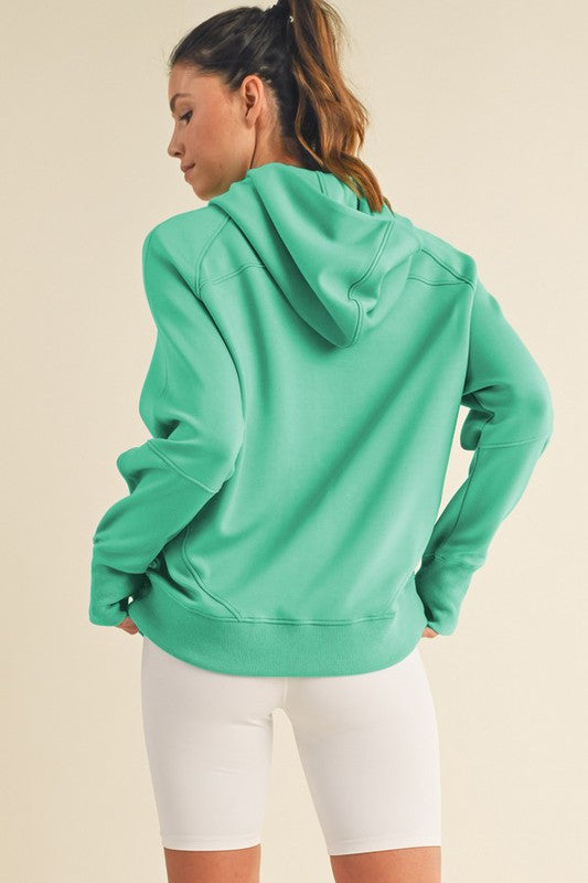 Women’s Ultra Comfy Quarter-Zip Hoodie in soft mint green with relaxed fit and ribbed cuffs