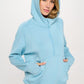 Women’s ultra comfy quarter-zip hoodie in soft light blue with kangaroo pockets