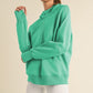 Women’s Ultra Comfy Quarter-Zip Hoodie in soft mint green with relaxed fit and ribbed cuffs