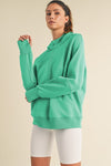 Women’s Ultra Comfy Quarter-Zip Hoodie in soft mint green with relaxed fit and ribbed cuffs