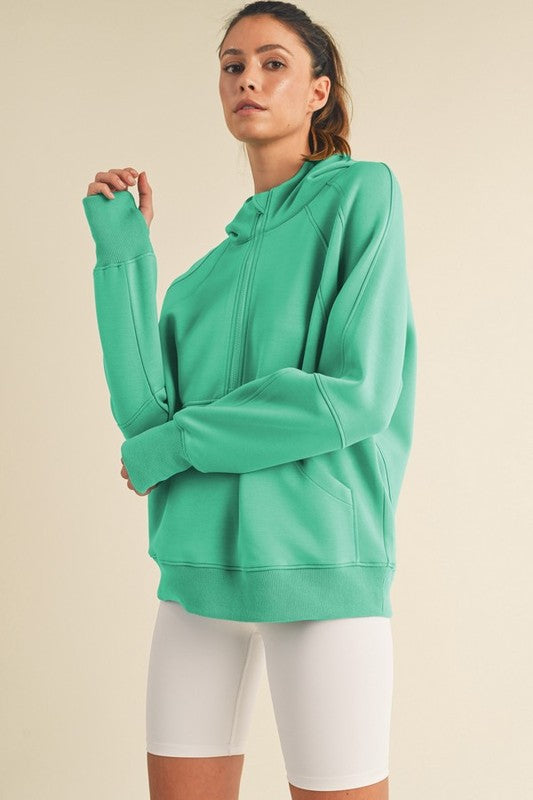 Women’s Ultra Comfy Quarter-Zip Hoodie in soft mint green with relaxed fit and ribbed cuffs