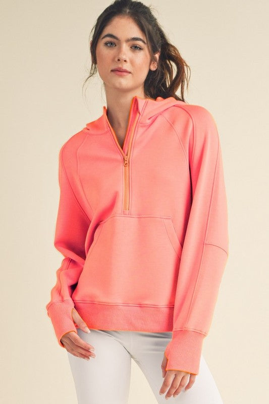 Women’s Ultra Comfy Quarter-Zip Hoodie in coral with hood and pocket