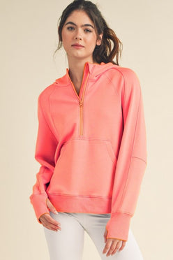 Women’s Ultra Comfy Quarter-Zip Hoodie in coral with hood and pocket
