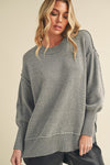 Ina Sweater: soft heather gray oversized knit with ribbed cuffs