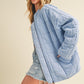 Light blue quilted Dixie Jacket with oversized fit and visible stitching