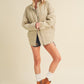 Beige quilted Dixie Jacket puffer with front zipper and ribbed cuffs