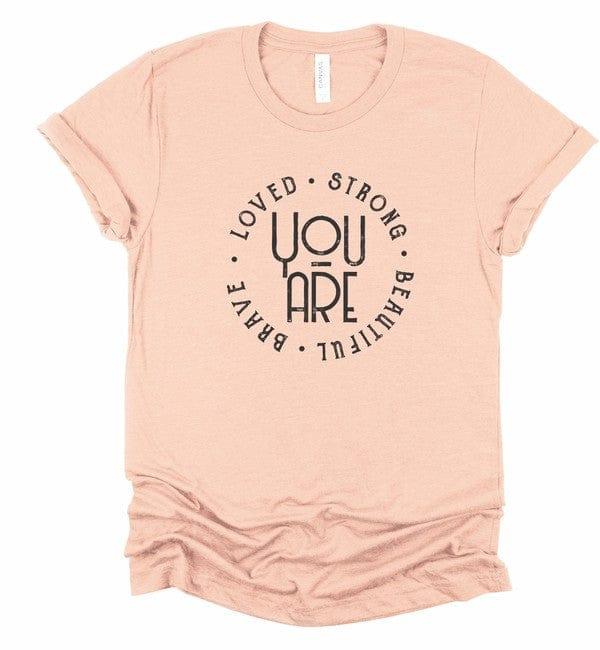 You’re Loved Strong Brave Beautiful Graphic Tee Heather Peach Graphic Tees