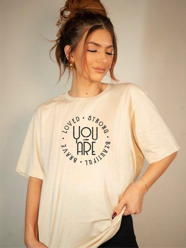 You’re Loved Strong Brave Beautiful Graphic Tee Cream Graphic Tees