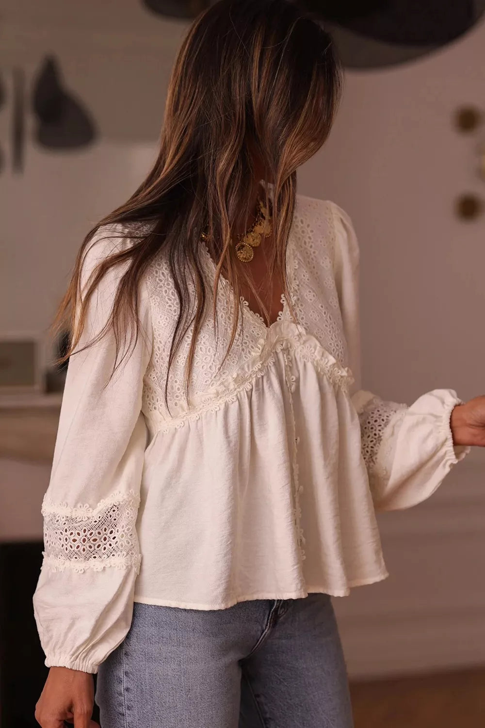 Delicate off-white Lace Trim V-Neck Blouse with intricate lace detailing