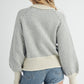 Aemi + Co Echo loose fit knit sweater in soft off-white with gray geometric pattern