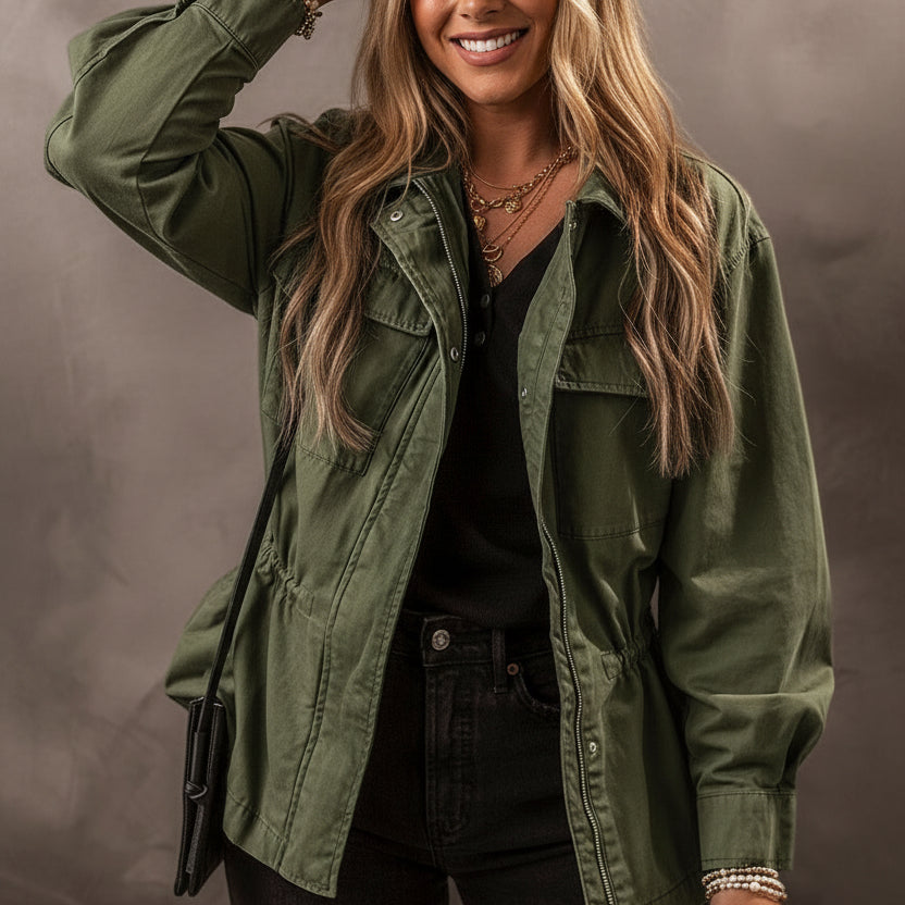 Olive green zip-up utility jacket with black accents and silver hardware