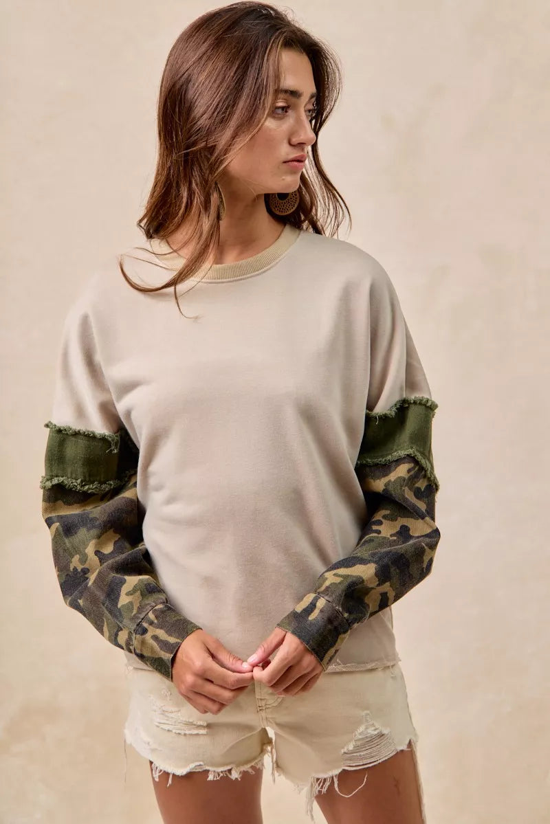 BiBi Camo Sleeve French Terry Top with Frayed Edge | Daverri Fashions