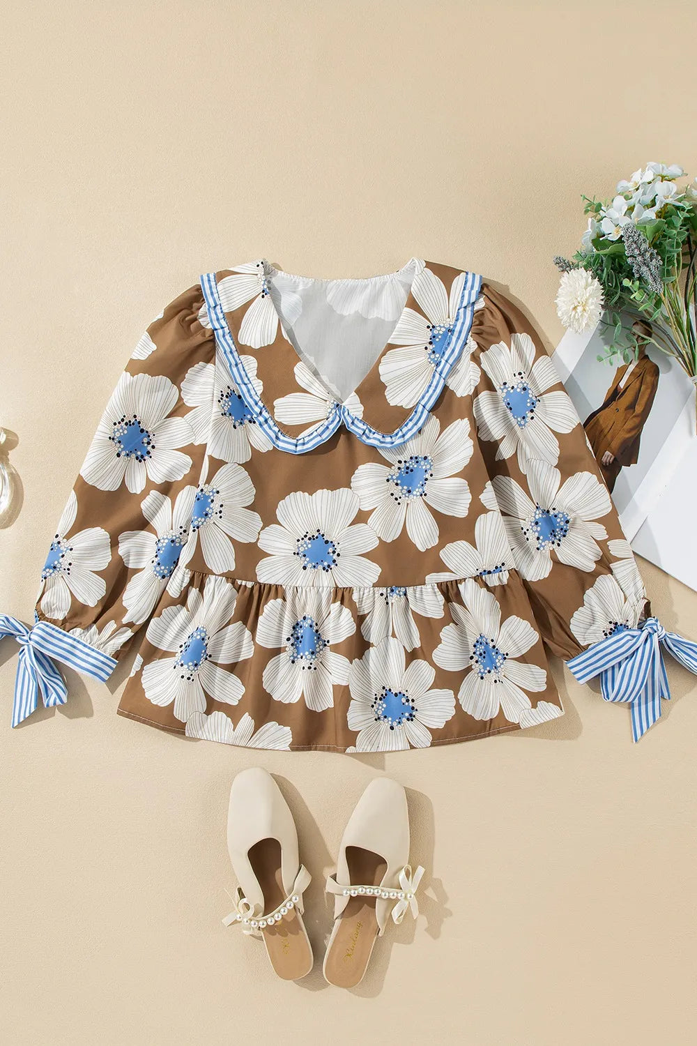 Brown floral print blouse with ruffled striped tie sleeves