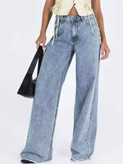 Light blue wide-leg denim jeans with frayed hems, high waist, pockets