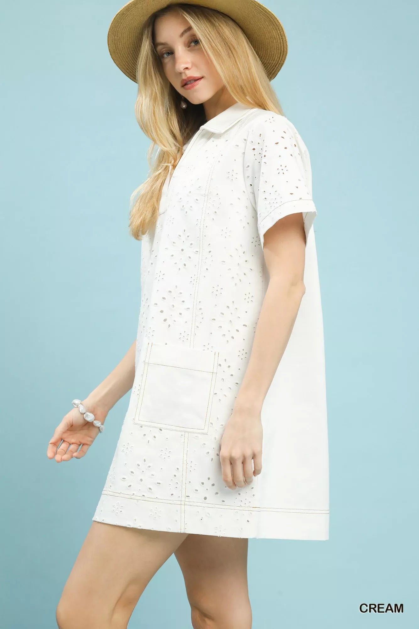 Cream-colored eyelet cotton Umgee short sleeve shift dress with collar and pocket