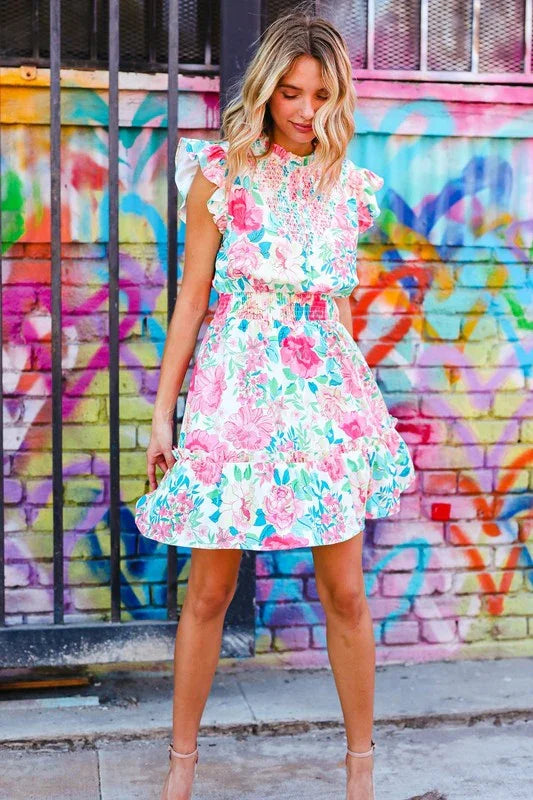 Under Your Spell Floral Smocked Flutter Sleeve Ruffle Mini Dress | Daverri Fashions