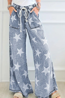 Blue denim wide-leg jeans with white star print and drawstring waist