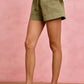 Olive green SO ME Paper Bag Patch Pocket Drawstring Twill Shorts relaxed fit front view