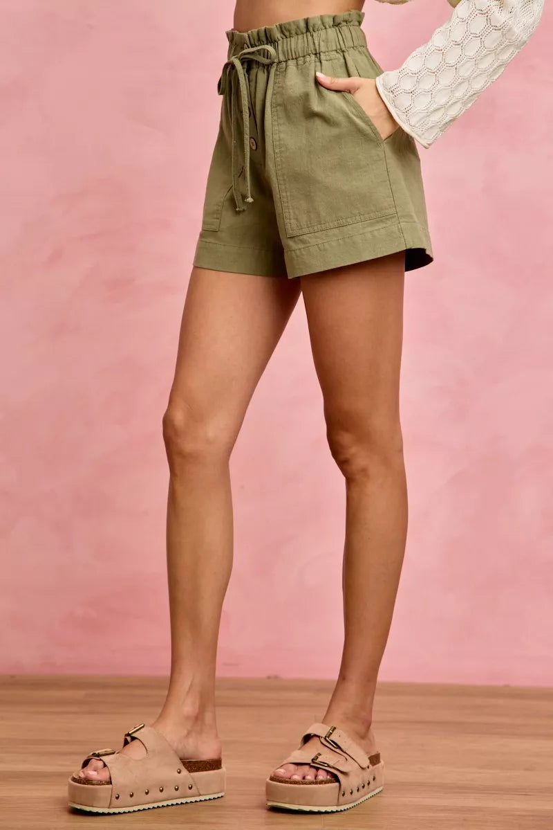 Olive green SO ME Paper Bag Patch Pocket Drawstring Twill Shorts relaxed fit front view