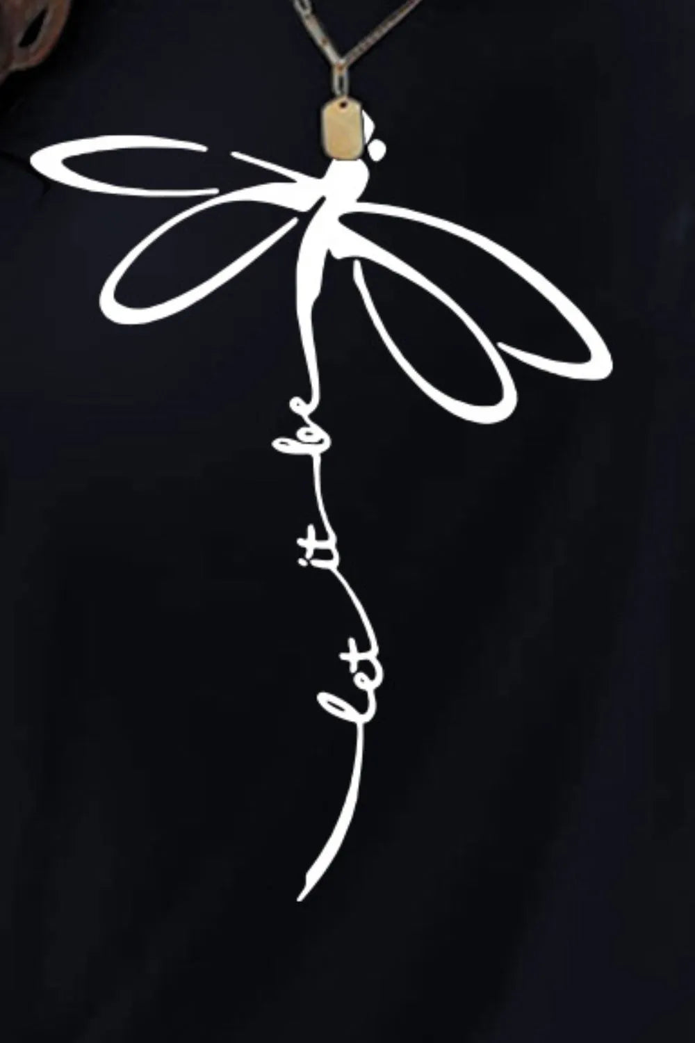White dragonfly pendant necklace on graphic round neck t-shirt