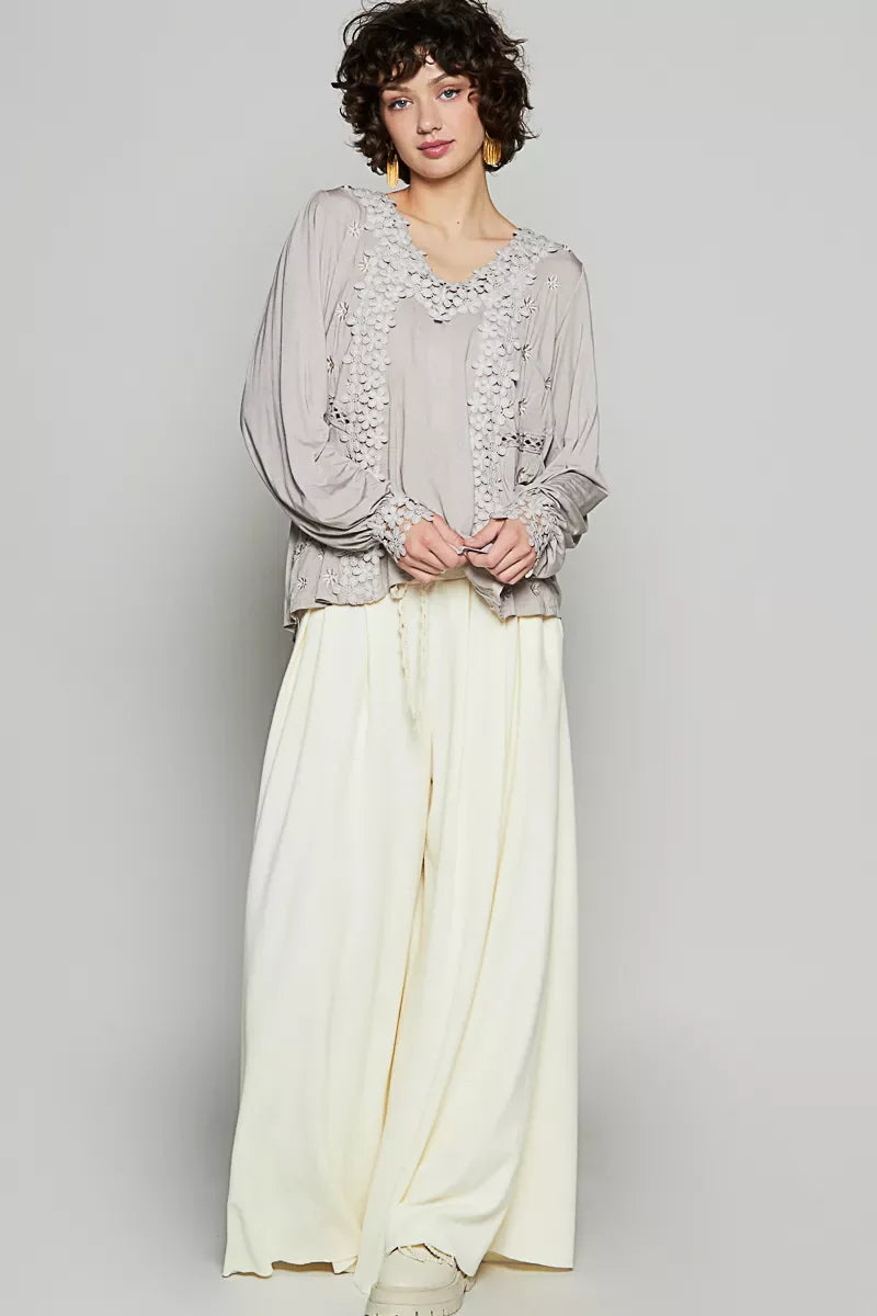 Cream wide-leg pants with lace hem and POL Floral Embroidery Top