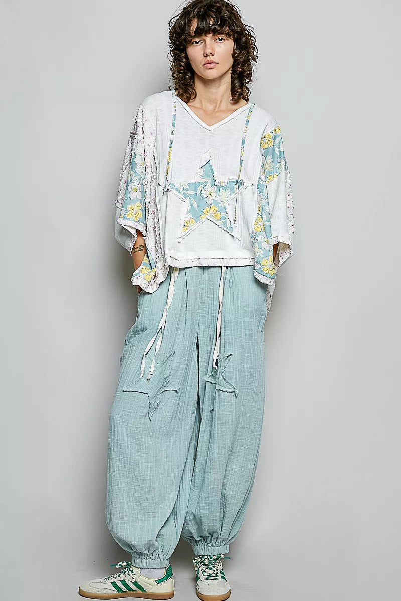 POL Floral Star Patch Hooded Blouse with white star pattern, floral embroidery, and flowing lace sleeves