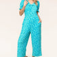 PLUS Spring Vibes Aqua Ikat Print Ruffle Sleeve Wide Leg Jumpsuit - DAVERRI FASHIONS