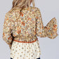 Yellow printed floral bell sleeve V-neck peplum blouse in beige