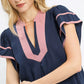Navy blue Umgee linen ruffle sleeve top with pink trim