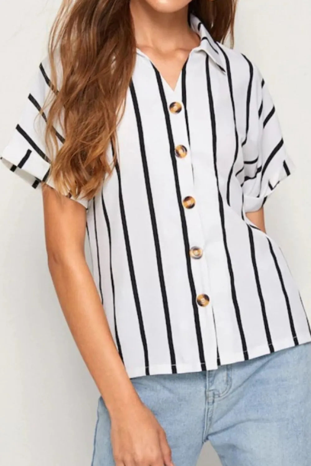 White and black striped short-sleeve button-up shirt with gold buttons