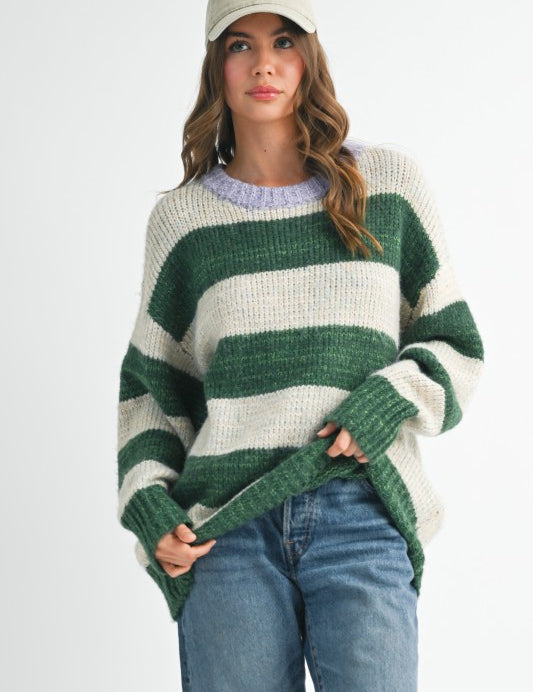 Oversized green and white striped sweater with ribbed cuffs