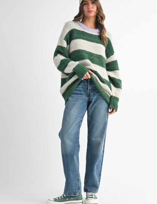 Oversized green and white striped sweater with ribbed cuffs and hem