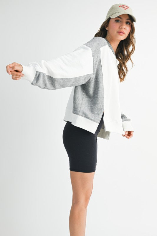 Women’s two-tone bomber jacket in white and heather gray with ribbed cuffs