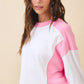 Colorblock terry pullover sweatshirt in white and pink with raglan sleeves
